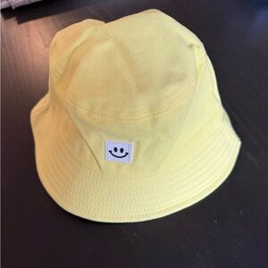 Yellow Bucket Hat with Smiley Patch